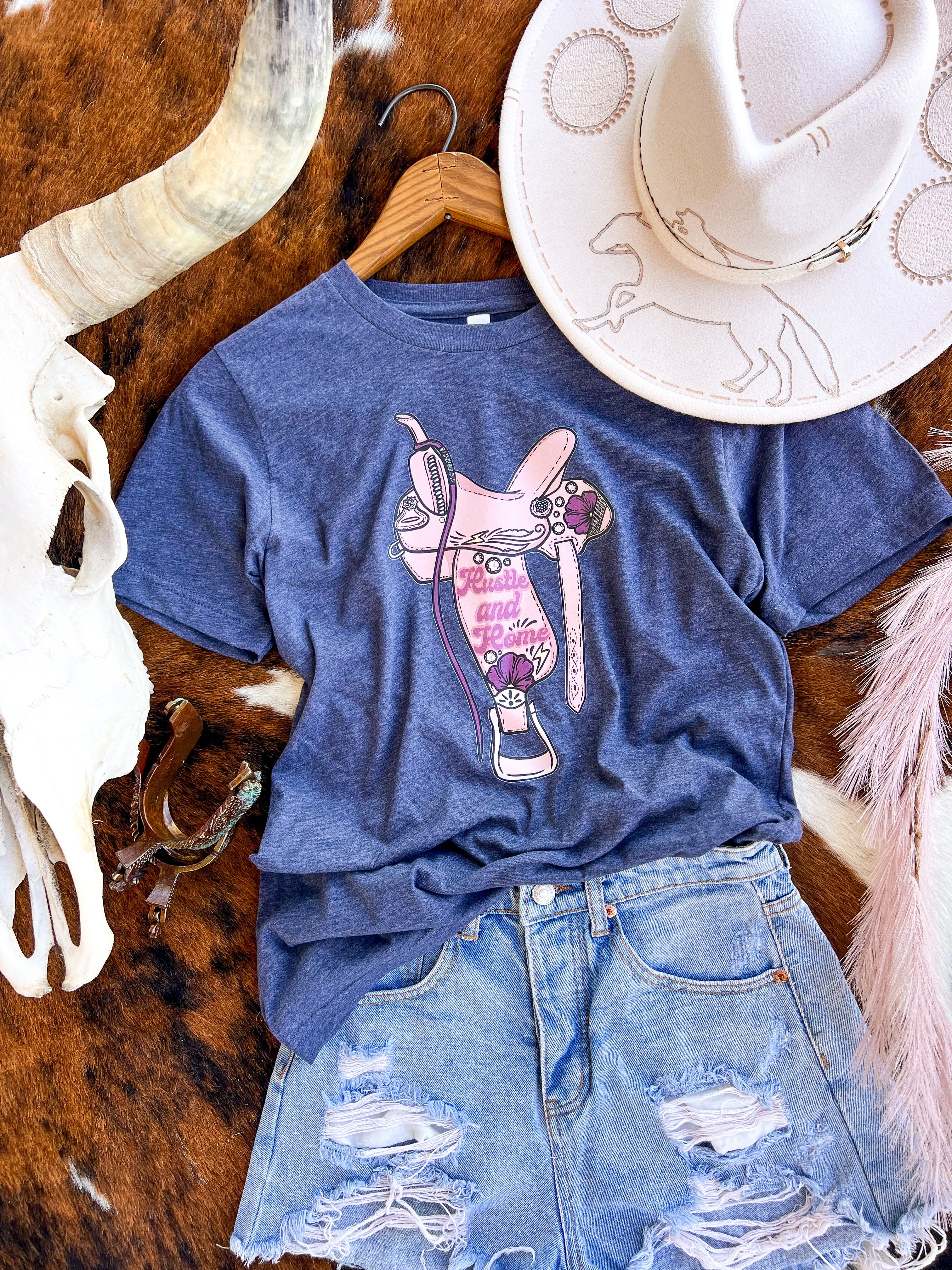 Hustle and Home Pink Saddle Secrets Tee