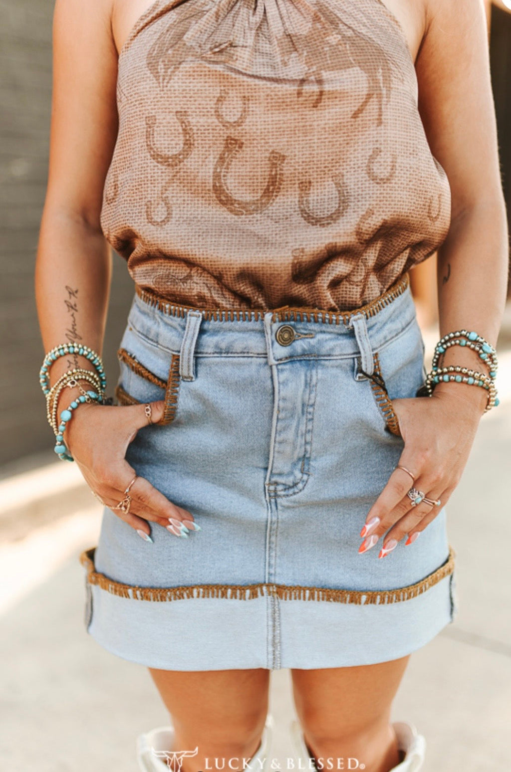 The Della Light Wash Denim Mini Skirt