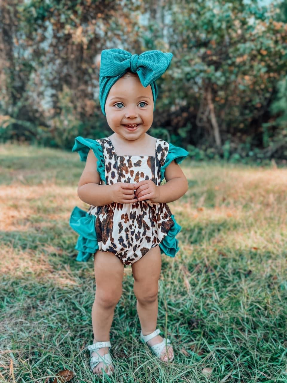 The Sissy Cowhide Ruffle Romper