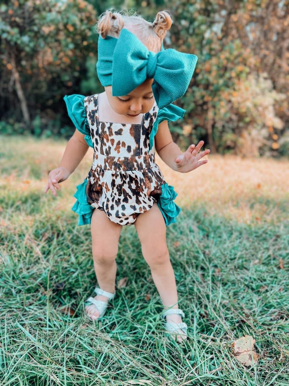 The Sissy Cowhide Ruffle Romper