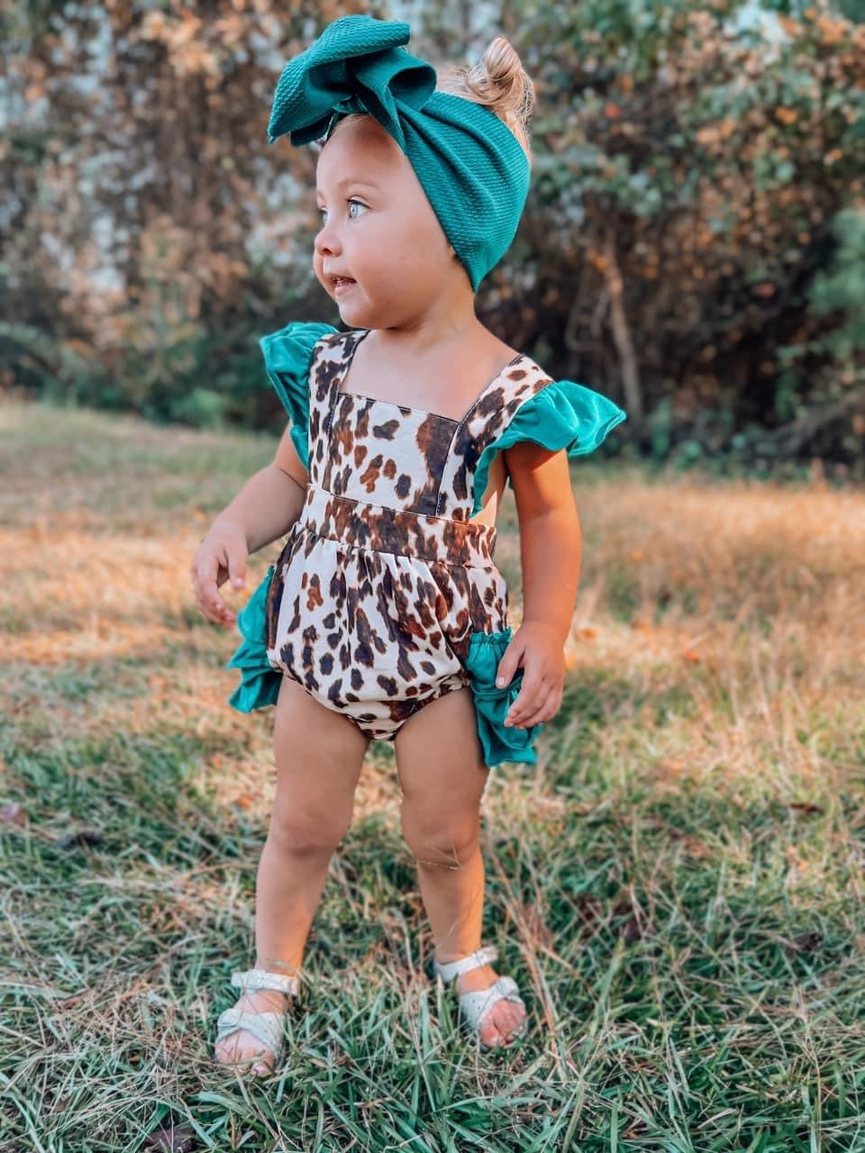 The Sissy Cowhide Ruffle Romper
