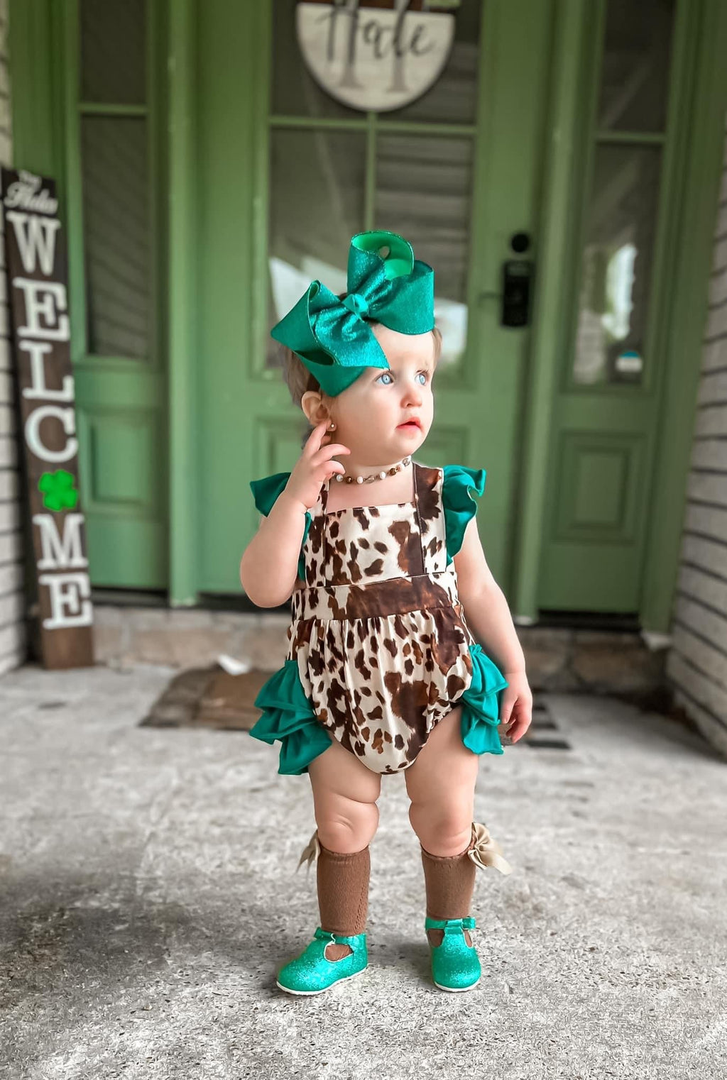 The Sissy Cowhide Ruffle Romper