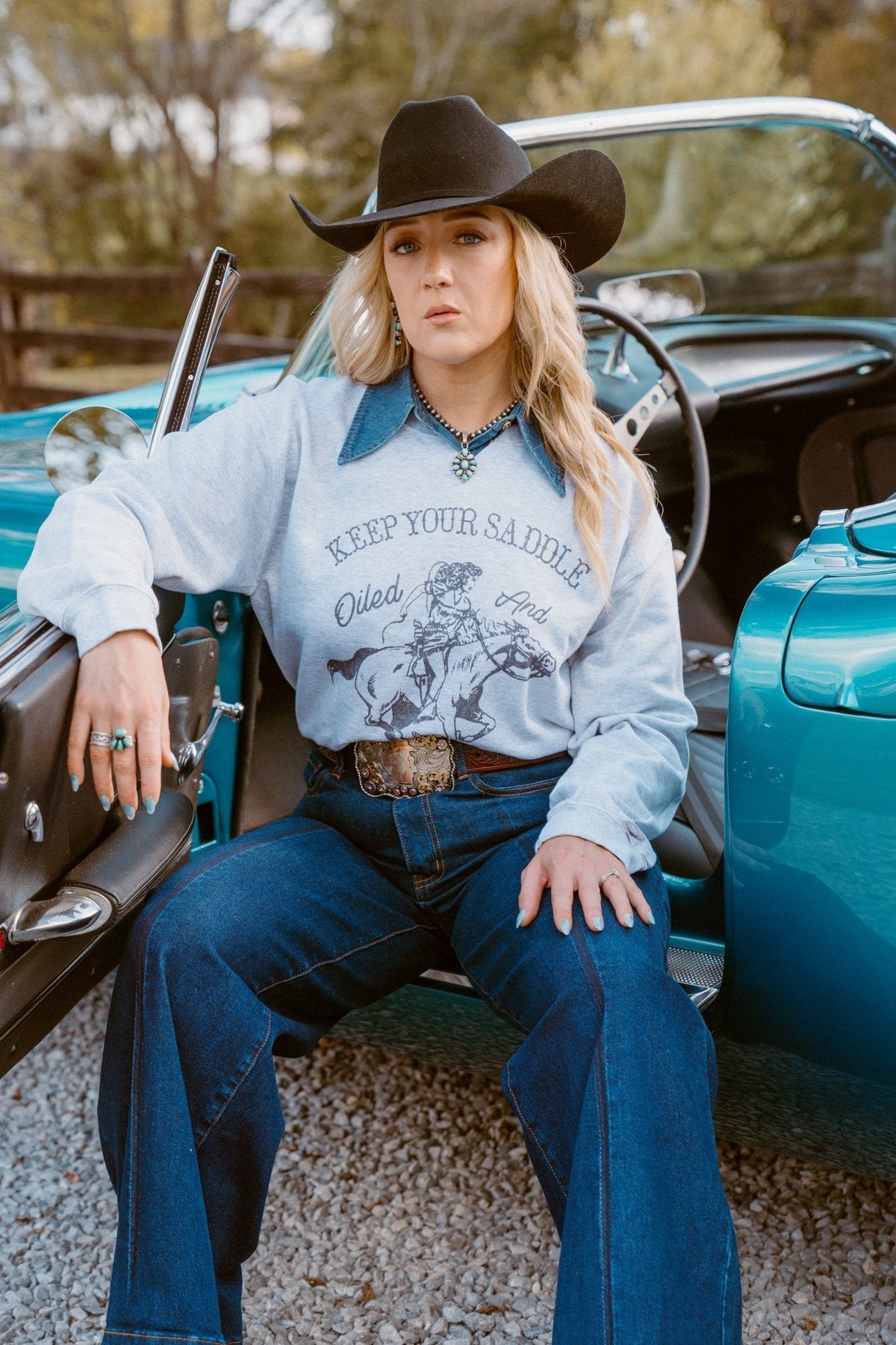 The Saddle Oiled Raw Hem V-Neck Graphic - Available in Sweatshirt & Tee!